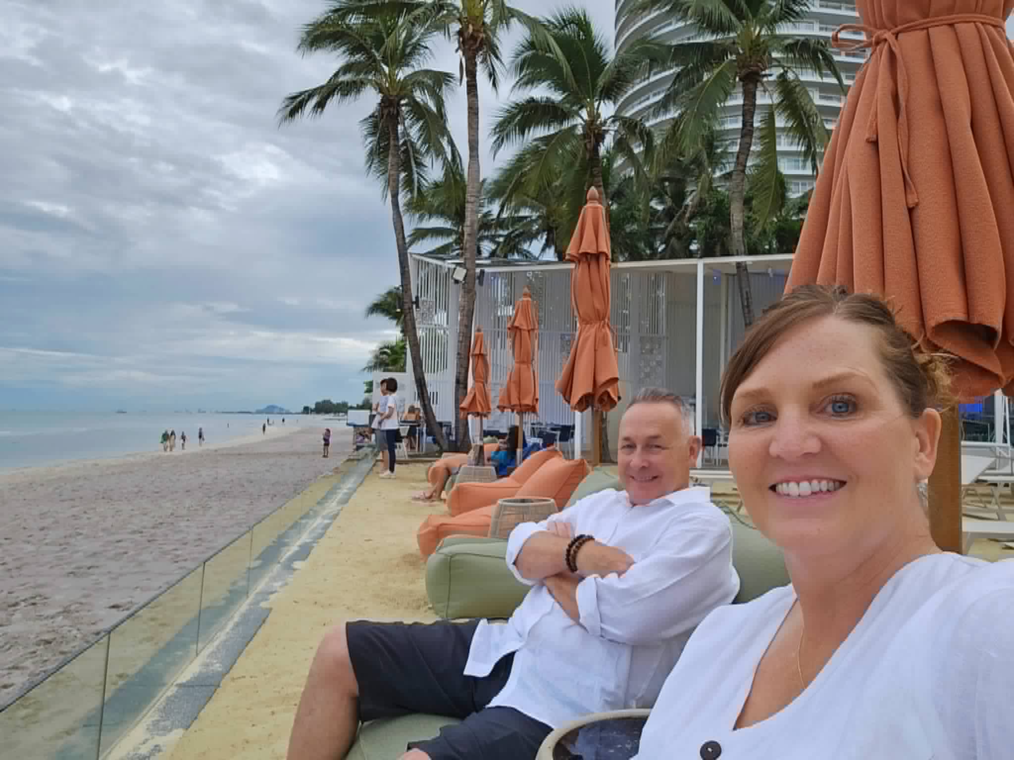 Tyke & Tina on a beach during their travels
